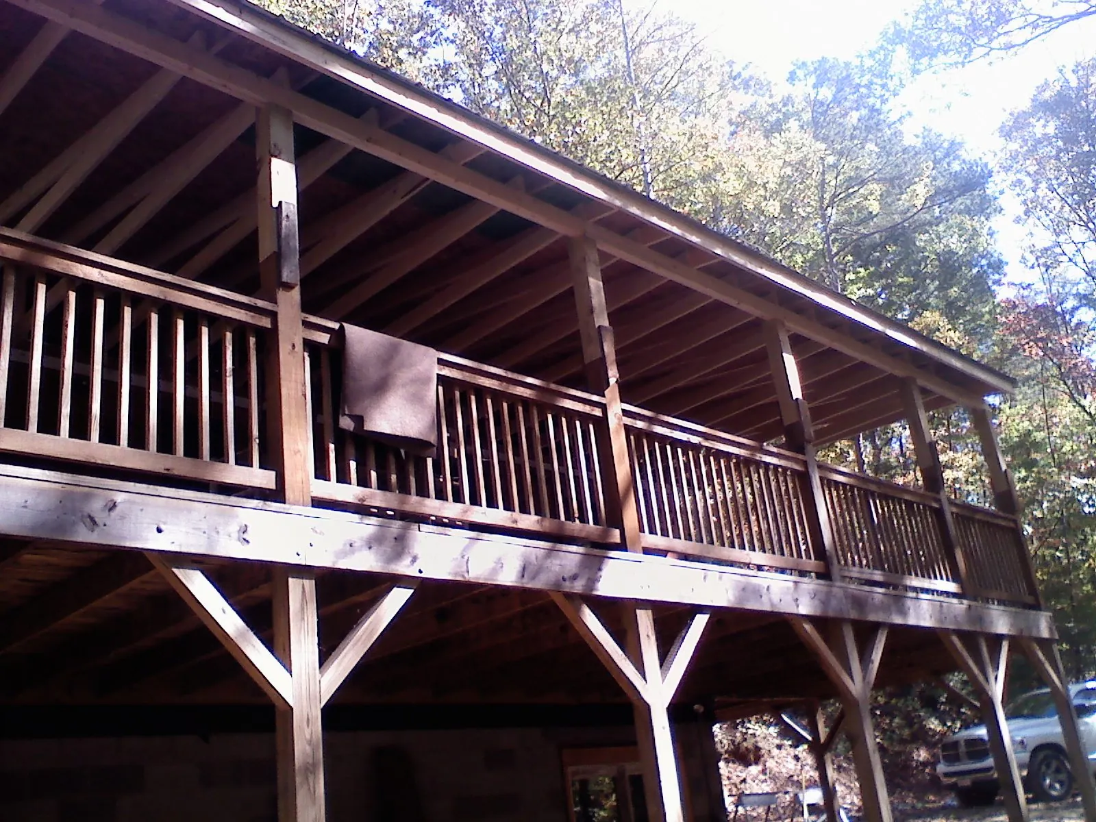 Timber framing under a new elevated porch and deck — Roof Leak Repair in Chicago by Roofing Brothers